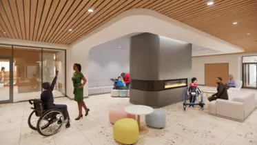 The new BC Children’s Hospital centre for health complexity lobby lounge and fireplace